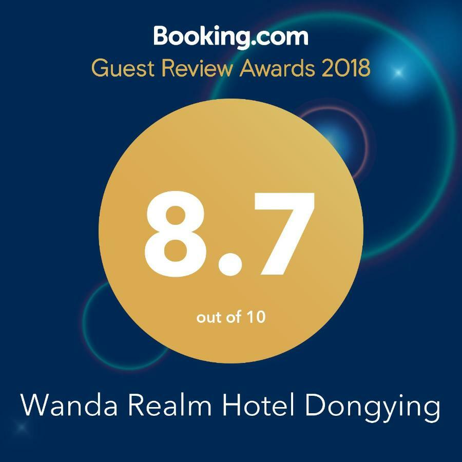 Wanda Realm Hotel Dongying Esterno foto
