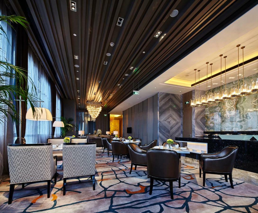 Wanda Realm Hotel Dongying Esterno foto
