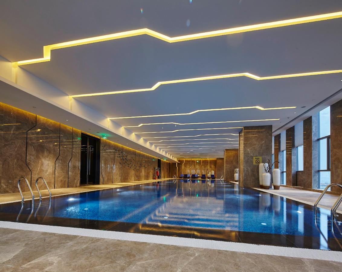 Wanda Realm Hotel Dongying Esterno foto